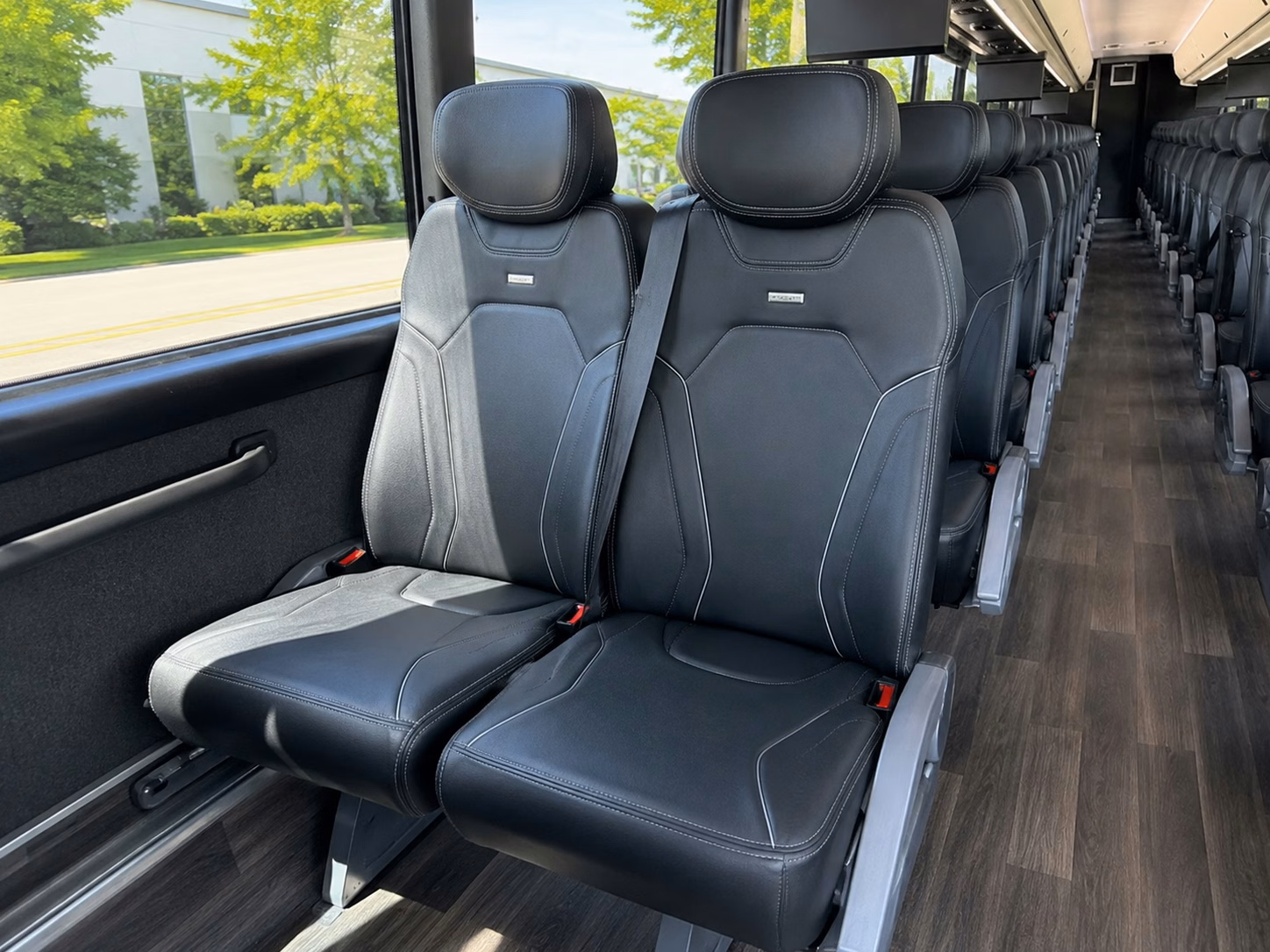 instead of splitting your group into rideshares keep everyone together on one bus